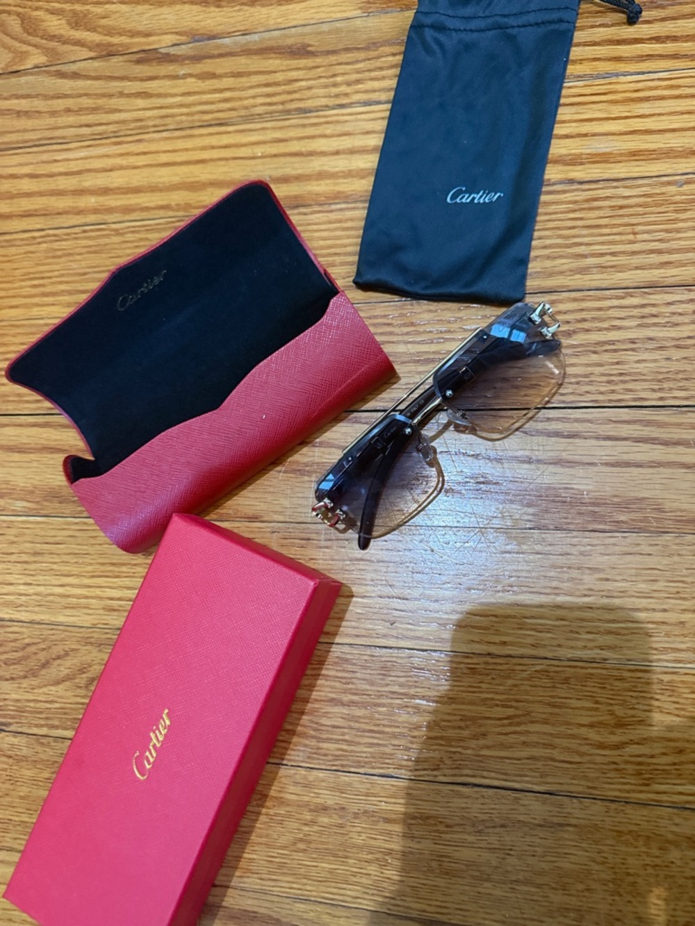 Cartier look alike plastic Rimless Sunglasses with Black Temples and Red Case